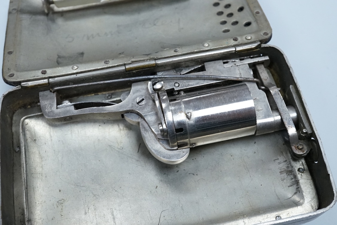 A five shot, 5mm self cocking pinfire Frankenau patent revolving purse pistol, London and Continental proof marks, lid engraved; ‘5mm Eley’, complete with ejector rod